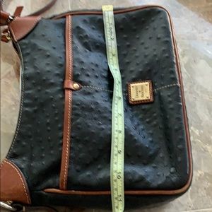 Black leather Dooney and Bourke bag.